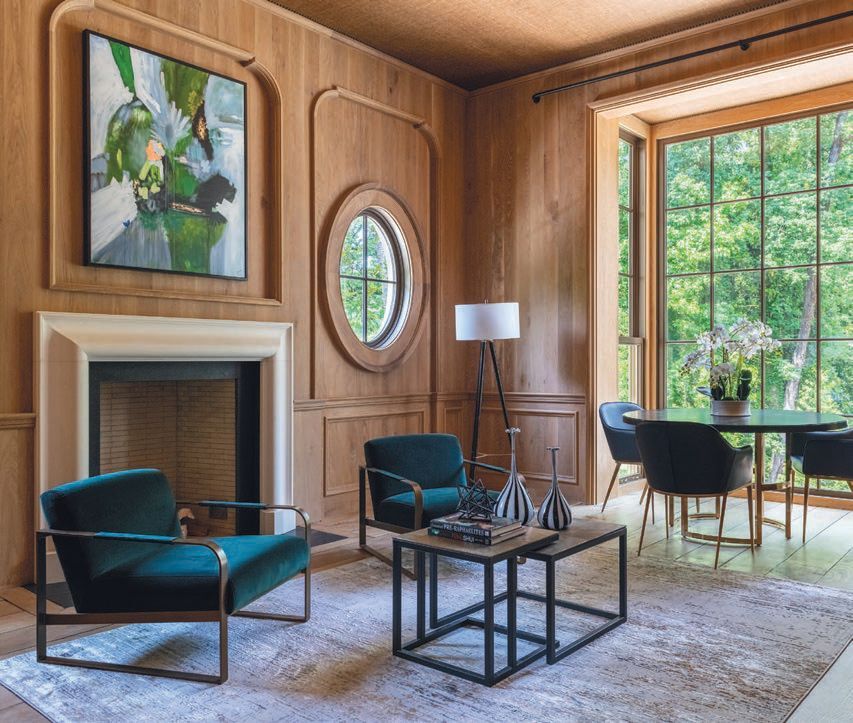 The paneled library featuring custom woodwork PHOTO COURTESY OF ENGEL & VOLKERS ATLANTA