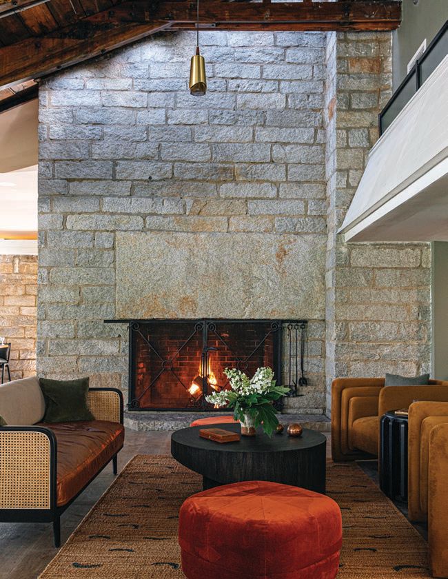Native stone and reclaimed wood feature prominently in Skyline Lodge’s guest rooms PHOTO BY ANDREW CEBULKA