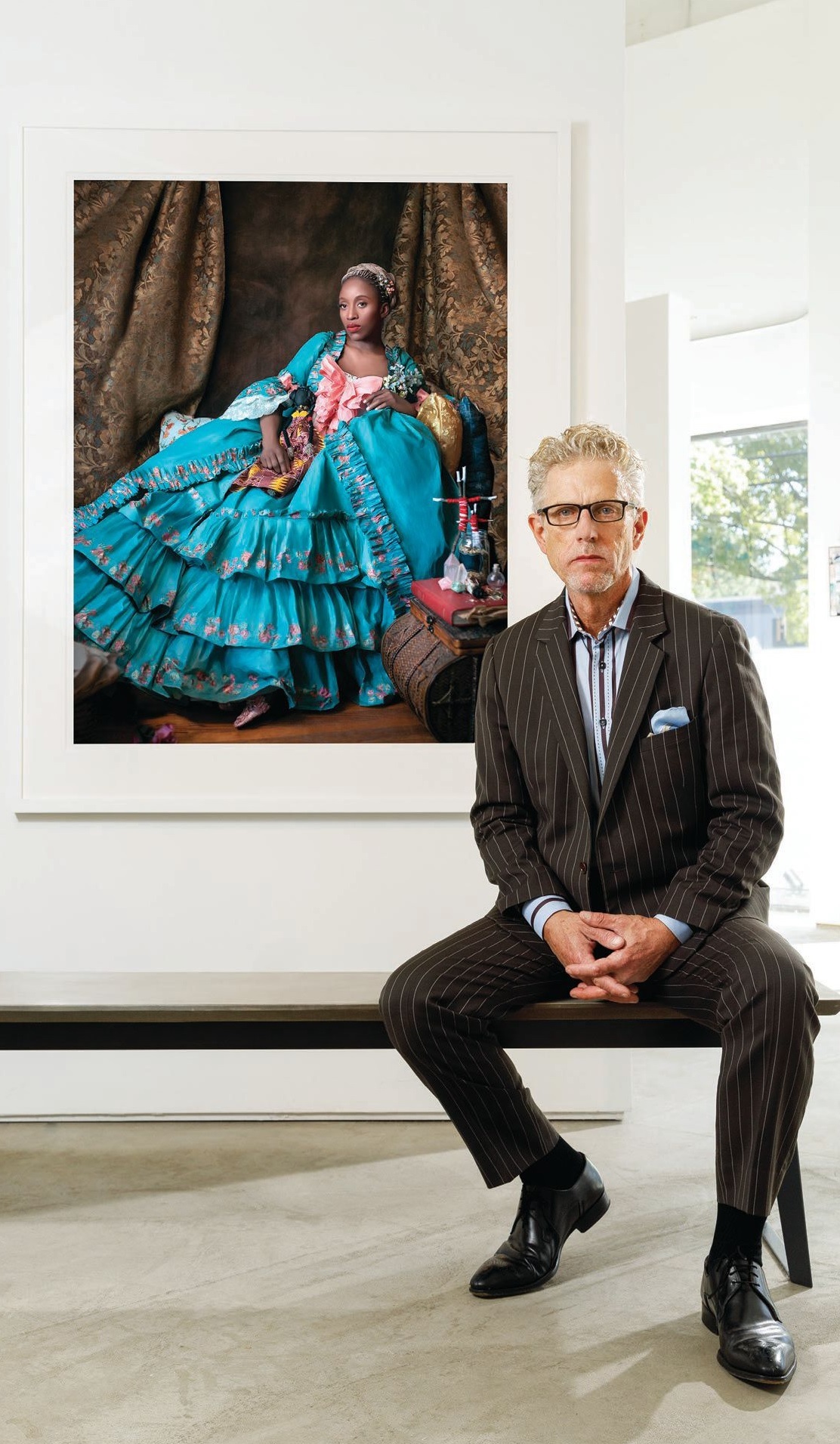 Alan Avery with a work by Fabiola Jean-Louis. PHOTOGRAPHY BY PATRICK HEAGNEY